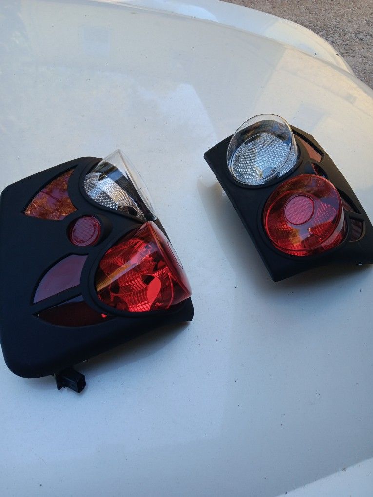 Jeep Grand Cherokee back lights. 1(contact info removed)