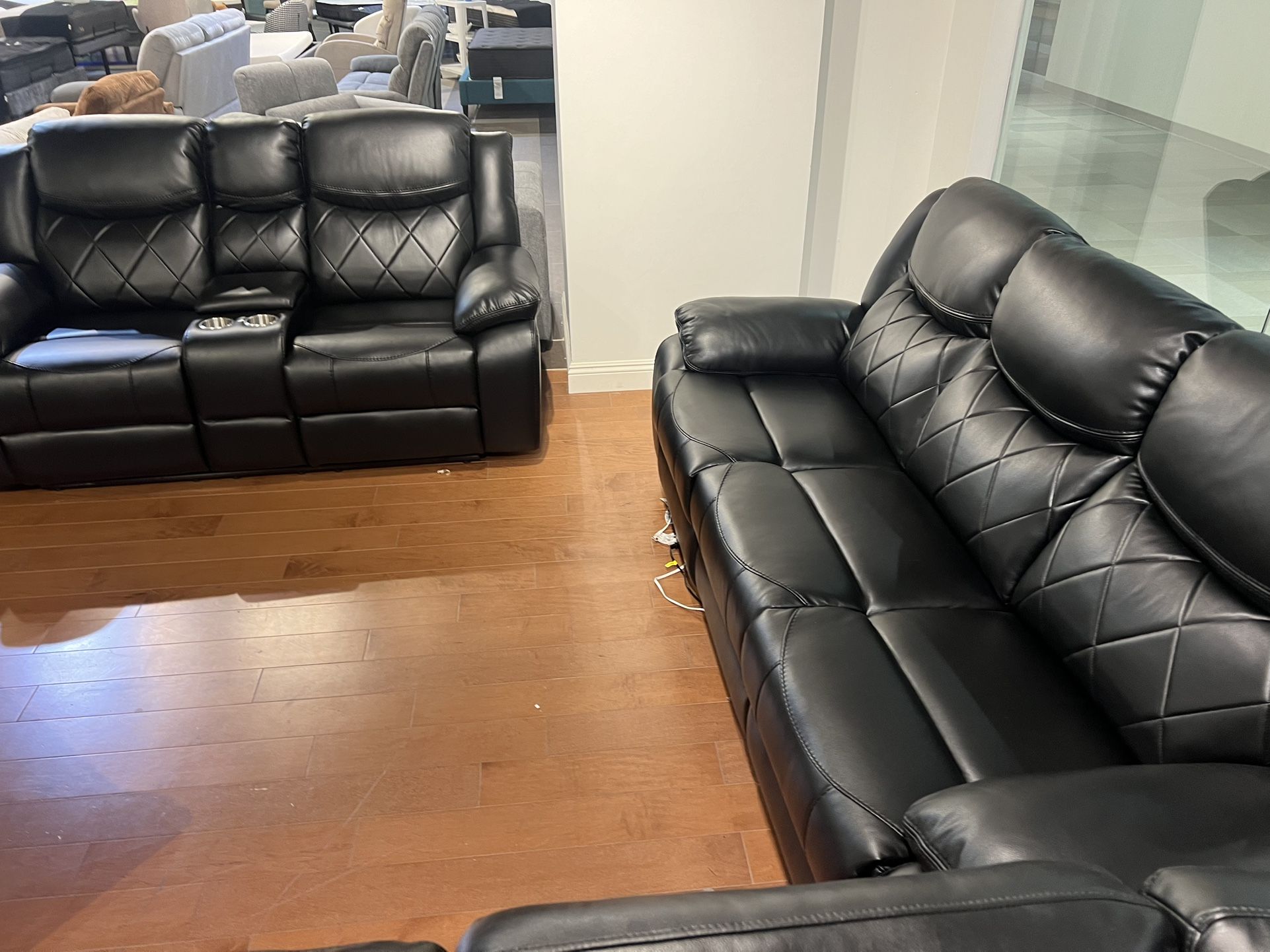 New Power Reclining Couch / Love Seat.  Black Leather.  Free Delivery!