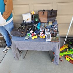 Garage Sale today hot wheels nerf pokemon coach kors clothes jeans chair furniture stuffed animals 