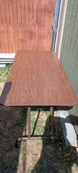 Folding table wood and great condition 72 inch by 30