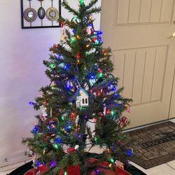 4 Foot Artificial Christmas Tree With Lots of Tinsel to Decorate 