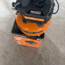 6 Gal. 150 PSI Portable Electric Oil-Free Jobsite Pancake Air Compressor with Dual Pressure Gauges and 2-Quick Couplers by RIDGID