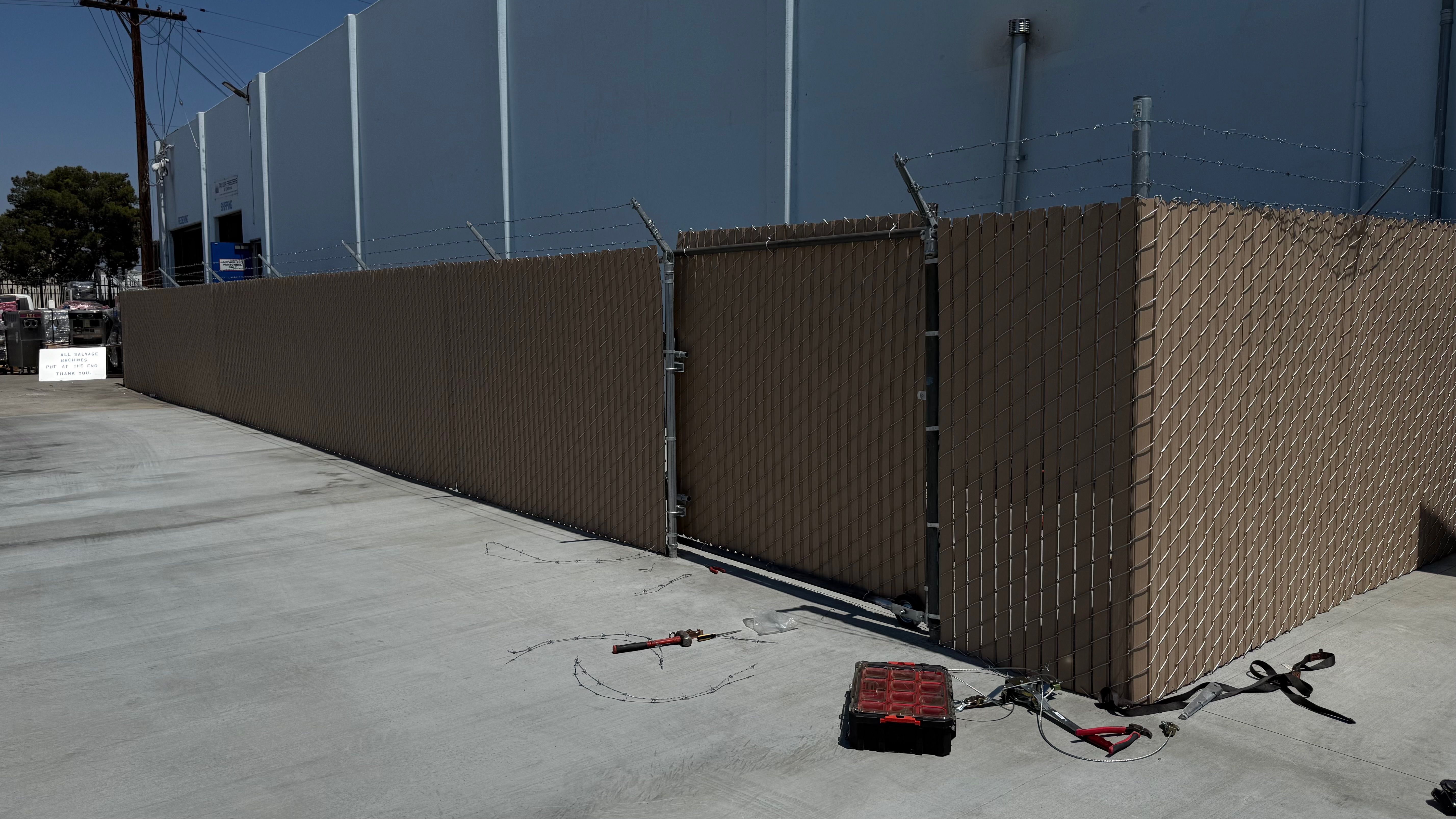 Commercial Chain Link Fence with Privacy Slats & Barbed Wire