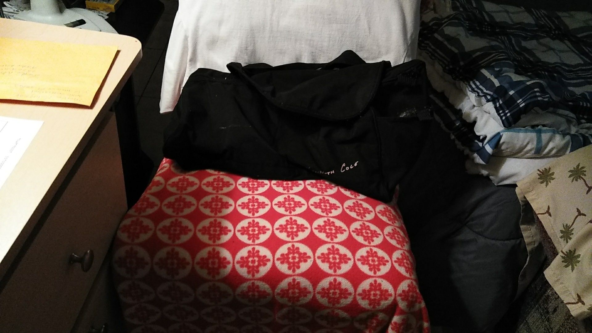 A small black duffle bag not sold