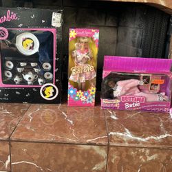 Barbie dolls and assorted toys