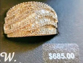 $230.00 size 6 or 7 Bagguete Diamonc

Ring in 925 Silver 25817