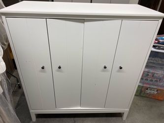 IKEA cabinet with folding doors