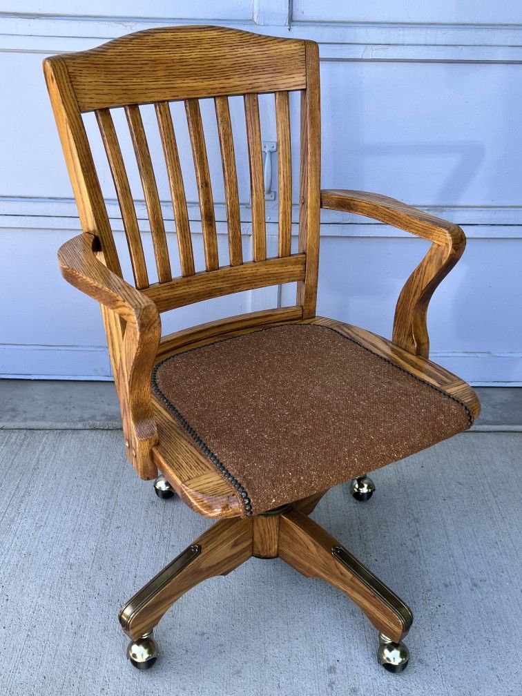 Adjustable Oak Swivel Desk Chair by JASPER Seating Company, Inc.