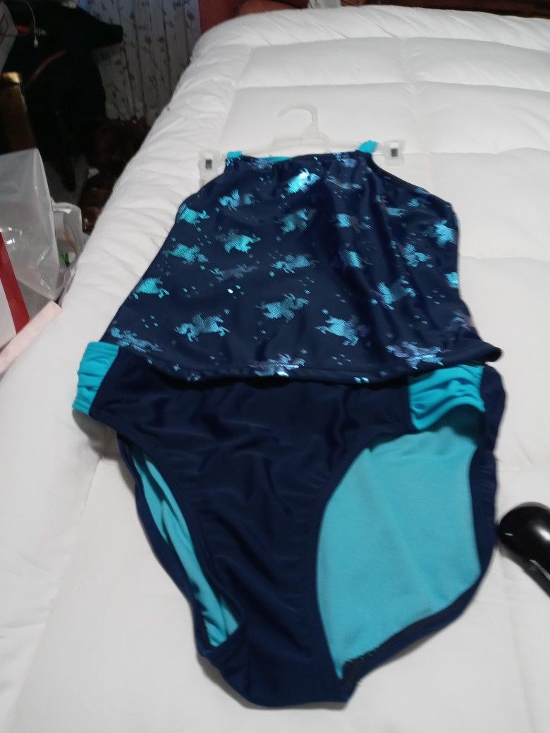 Wonder Nation Unicorn 2 Piece Girls Bikini, Navy Blue and Turquoise Blue Shimmery Unicorns thru out the top.  Very Cute.  Size 14-16 