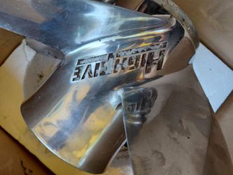 Boat HIGH FIVE chrome  propeller and a HYDRO SHIELD TO PROTECT the propeller