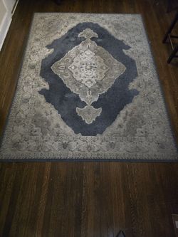 Two 7 X 9 Throw Rugs & One 5 X 9 1/2 Throw Rug