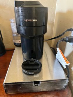 Nespresso Machine with pod storage includes