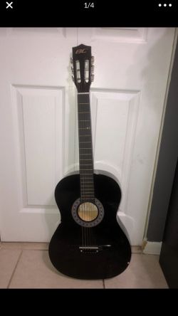 Guitar with carrying bag