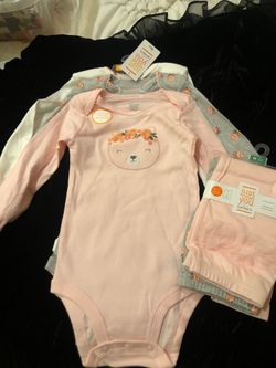 Carter’s three onesies and two leggings brand new