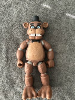 Used Funko Freddy action figure