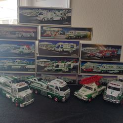 AMAZING HESS TRUCK COLLECTION. (12) NEW IN THE BOX AND (4) NEW NOT IN THE BOX. (16)  VEHICLES IN TOTAL.