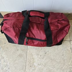 Red Travel Bag 24in by 10in / Mochila