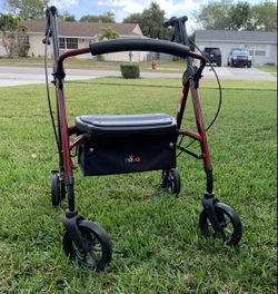Walker with wheels and seat