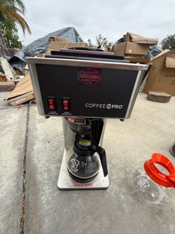 Coffee maker with hot water pitcher