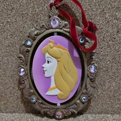 Disney Store Princess Aurora Sleeping Beauty Cameo Spinner Sketchbook Ornament.
