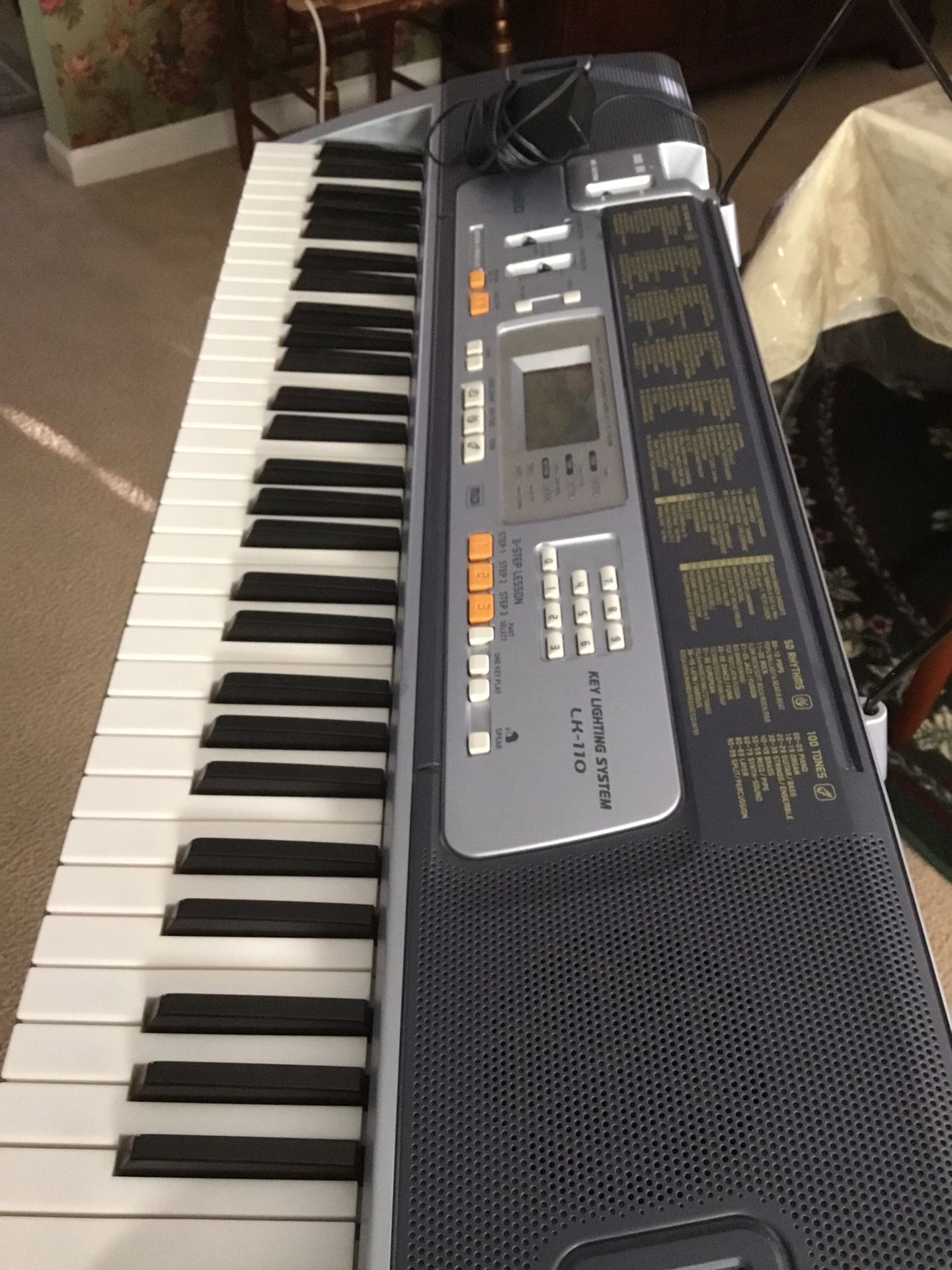 Casio Keyboard LK-110 w/Stand 100 Songs, 50 Rhythms, 100 Tones, 61 Keys. Plug In Has hairline crack in corner of frame. Ex..Cond. $75 for Sale in Taylors, SC - OfferUp