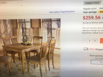 New Ashley rectangular dining table has some damaged