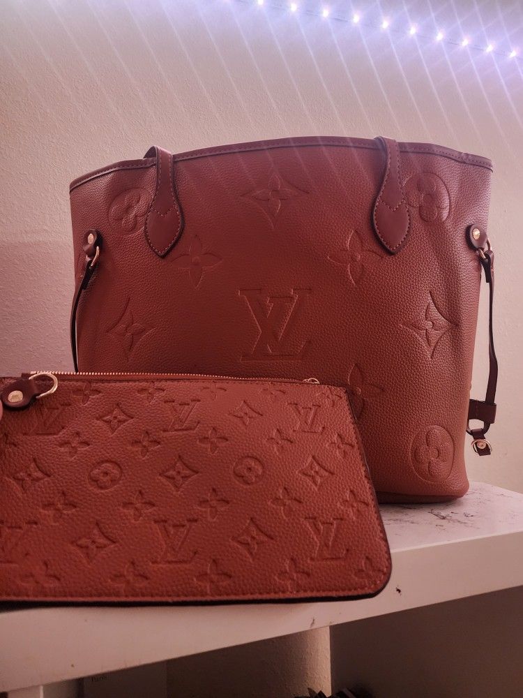 Cognac Brown Cow Hide Louis Vuitton Purse