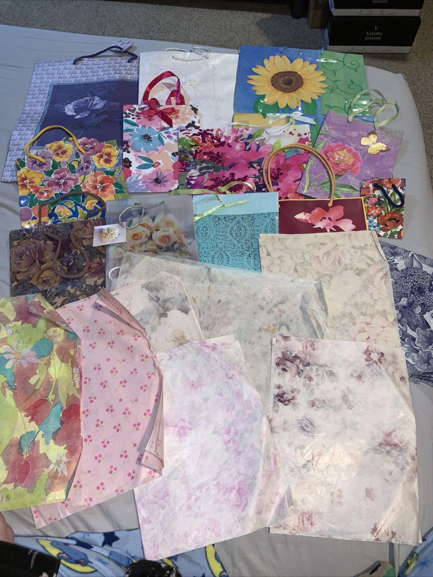 9 different themed gift bag/tissue paper lots. Shower, Birthday, Halloween, Valentines, Christmas, etc.