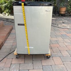 Refrigerator made by Magic Chef works great good condition. Just a few scratches.