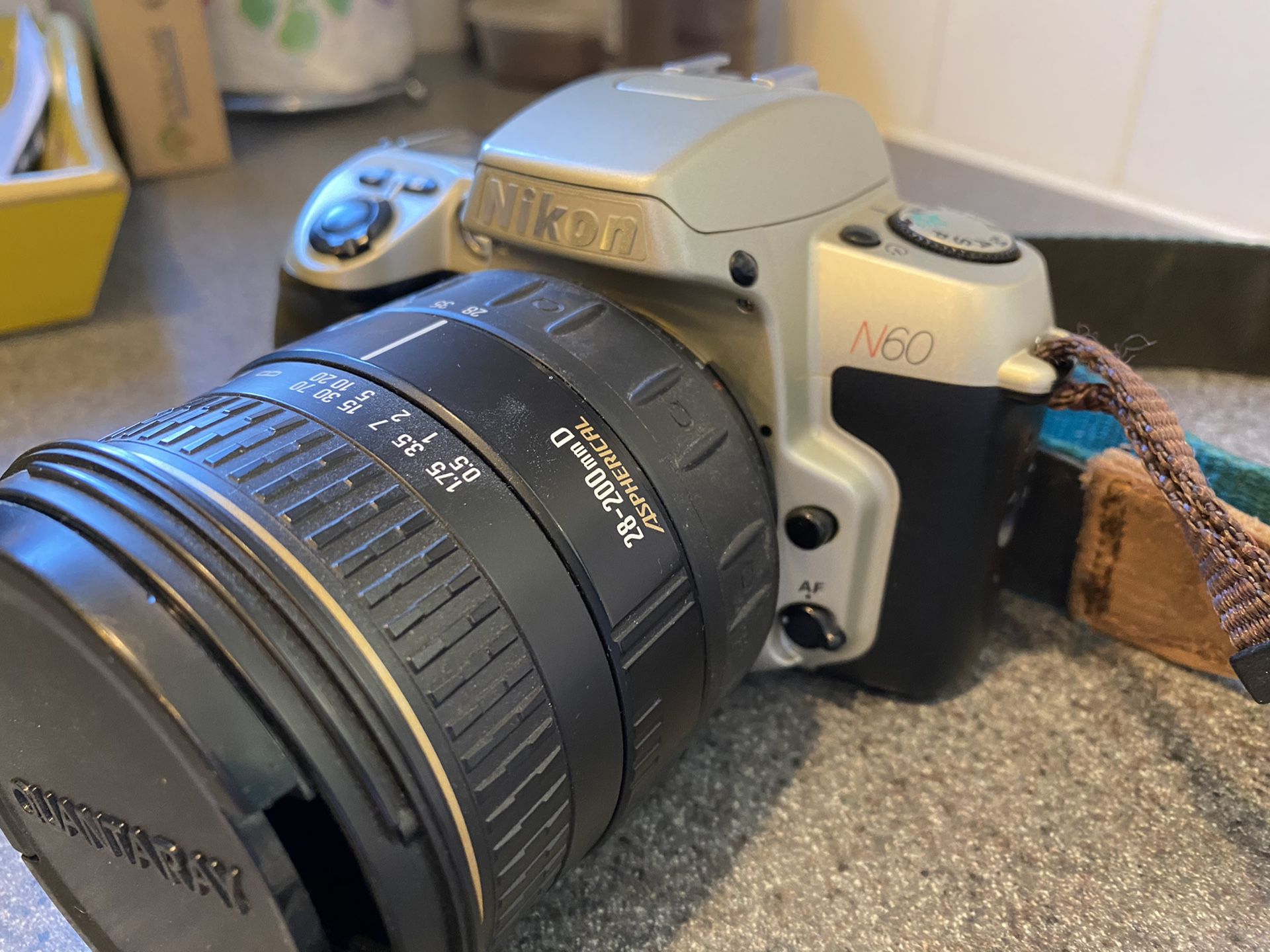 Nikon N60 SLR (film camera) with 28-200mmD Aspherical Lens (Quantaray)