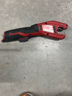Milwaukee Tool 2471-20 M12 Cordless Copper Tubing Cutter in red and black.