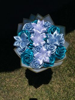 Light blue and teal ribbon flowers