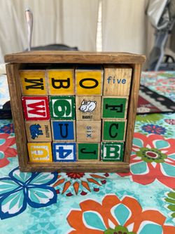 VTG Schylling wooden alphabet blocks featuring a colorful, embossed design.#48