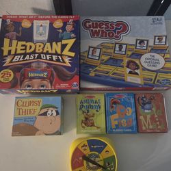 Board games ages 6+ Guess who , Clumsy thief , Animal Rummy,Go Fish, Old Maid, Headbanz blast off, Yoga Spinner Game