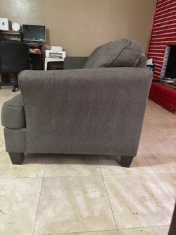 Charcoal grey apartment size couch