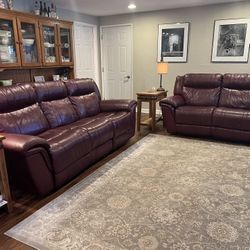 Reclining leather sofa & love seat