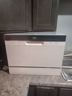 It's black white RCA kitchen counter dishwasher
