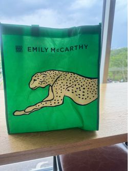 Authentic Emily McCarthy reusable tote featuring the iconic cheetah design.