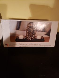 Great for a xmas gift. Brand new candle holder