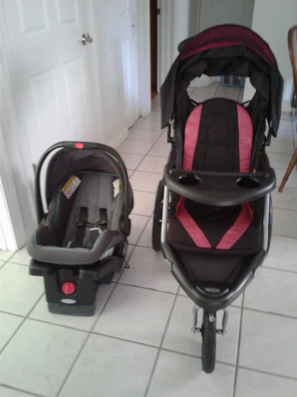 Graco baby car seat and running stroller with bluetooth for radio.