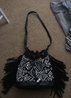 Fringe bucket bag.