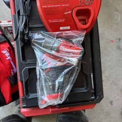 Milwaukee M12 Hammer Drill And Charger 