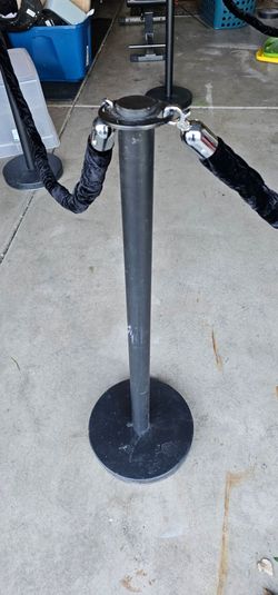 Stanchions with velvet ropes.