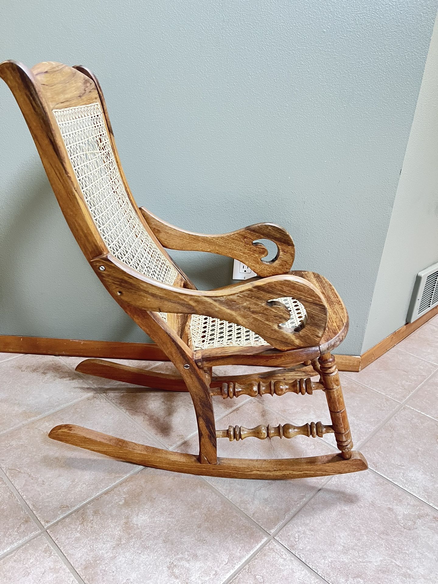 **For Sale: 1900s Walnut & Cane Children’s Rocking Chair – Vintage Charm with Character**