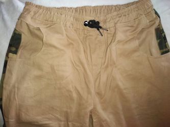 "A Sparkle Above" Khaki pants with with bits of camouflage. Checkout all my listings!)