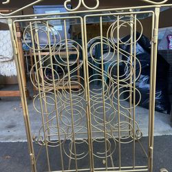 Gold Metal And Glass Wine Rack