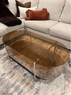 Amber glass and marble oval coffee table