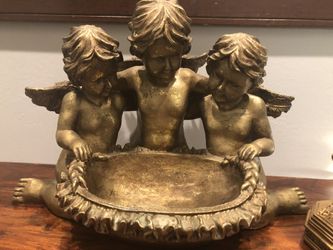a bowl with three angels and a hook holder for all $ 20