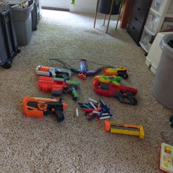 Nerf Gun Lot Of 7 Guns An Attachment And Bullets