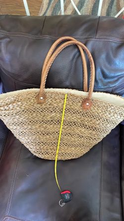 Oversized handwoven straw tote bag